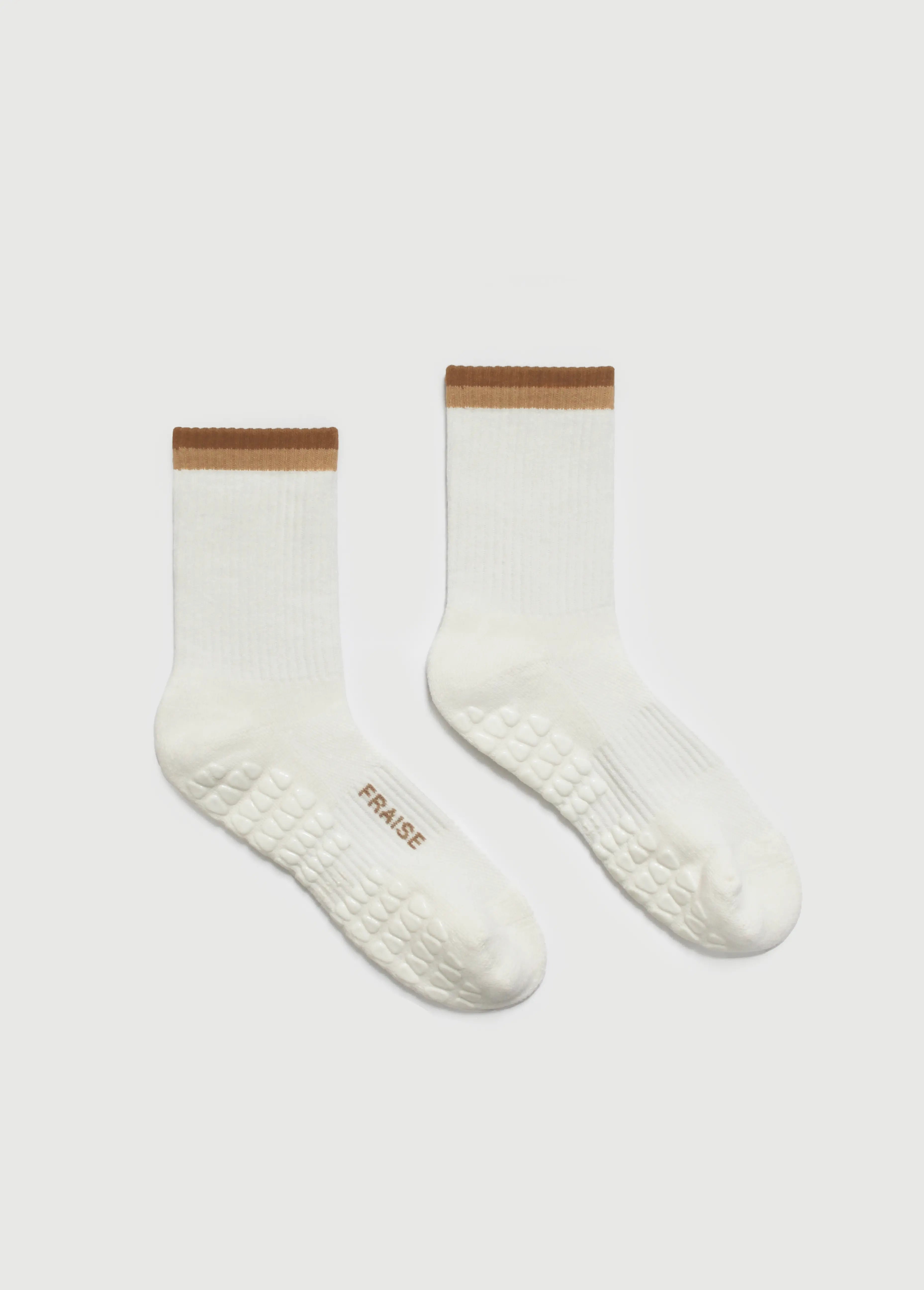 Fraise grip socks with stripes on them