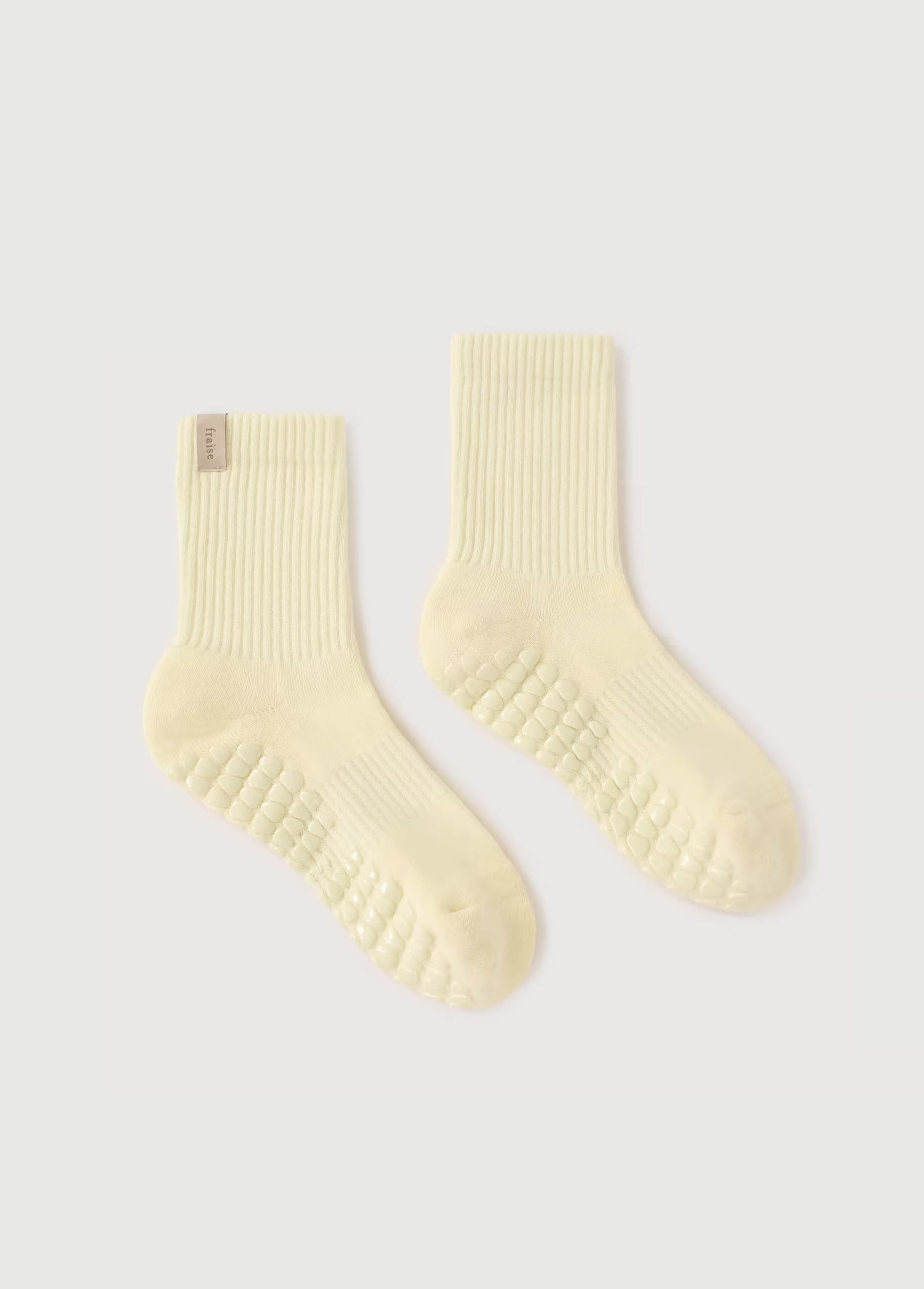 butter classic crew grip sock from fraise on a neutral background