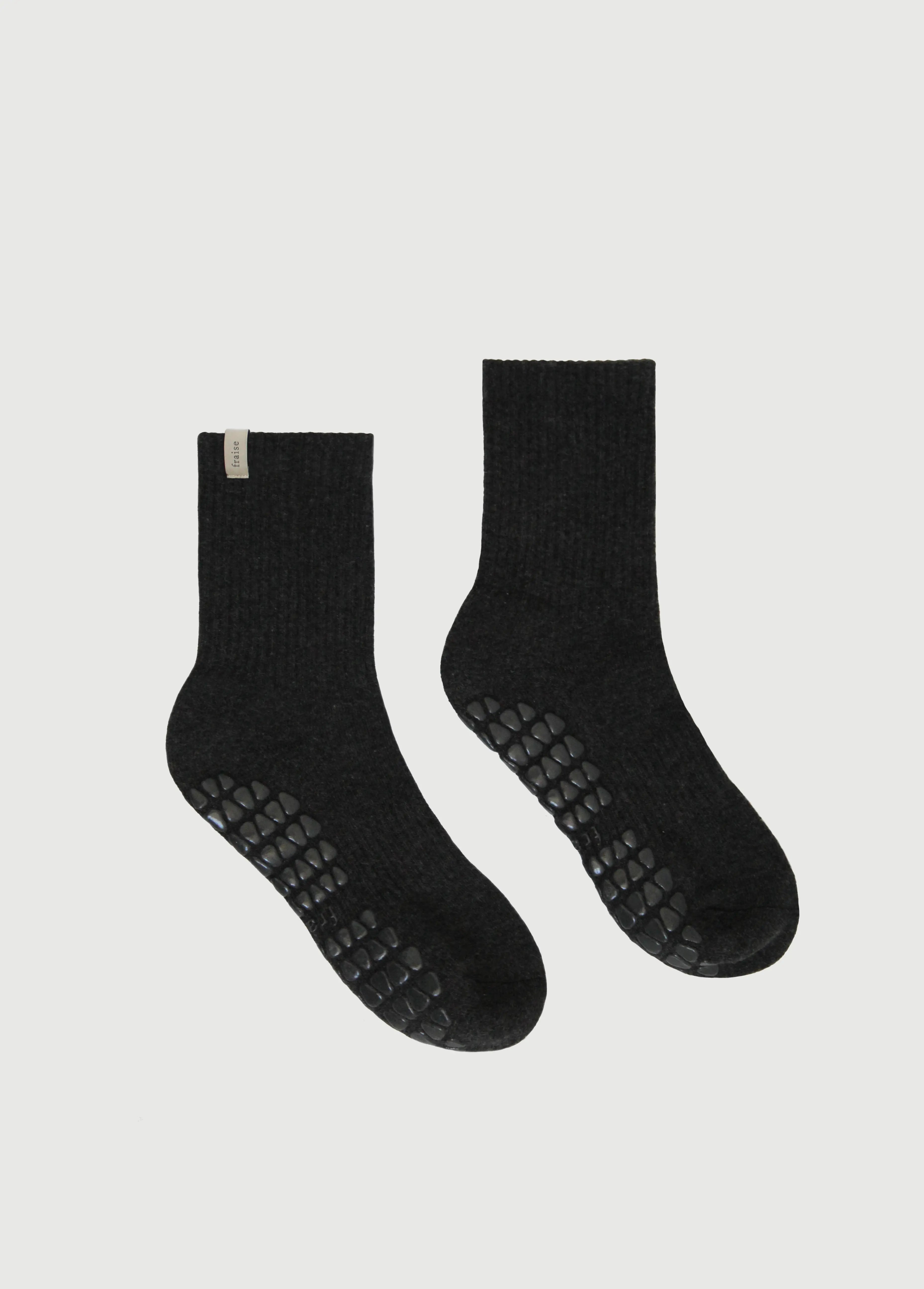 Pair of Fraise branded pilates grip socks in charcoal grey