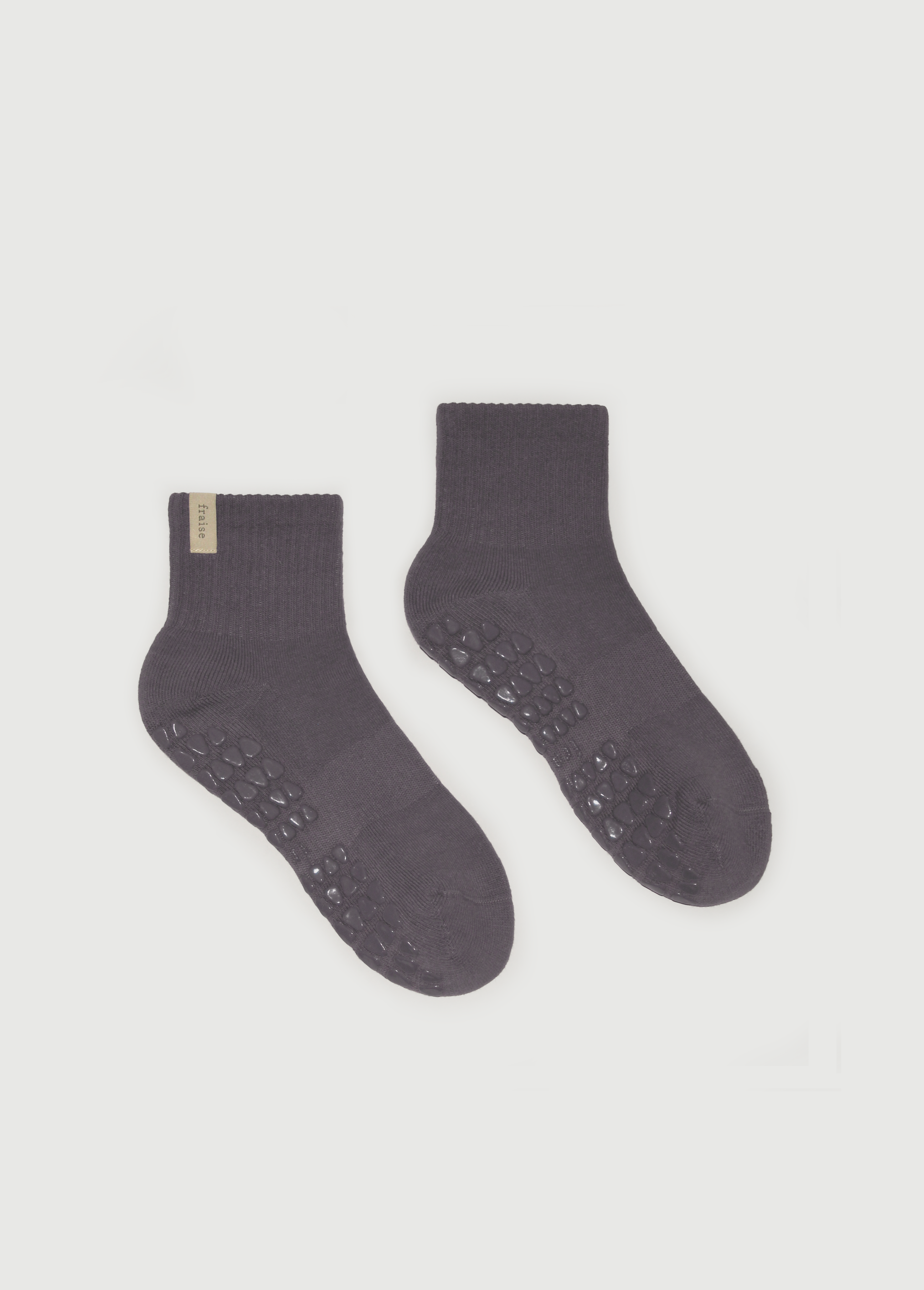 Pair of dark grey pilates grip socks